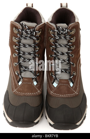 Coppia di donna di legare (lace up) resistente alle intemperie Snow Boots su bianco. Marrone, blu, nero. Foto Stock