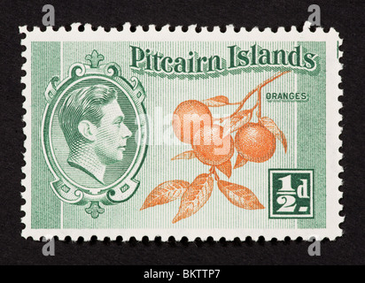 Francobollo dalle Isole Pitcairn raffiguranti le arance e George VI. Foto Stock