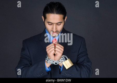 Imprenditore che ha legato le mani Foto Stock