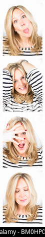 Giovane donna divertendosi in Photo Booth Foto Stock