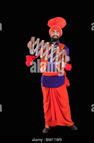Bhangra la tradizionale danza folk dal Punjab in India del Nord Foto Stock