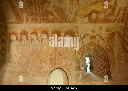 Regno Unito, Inghilterra, Herefordshire, Kempley, St Mary chiesa medievale dipinti a muro degli Apostoli seduti nella sentenza Foto Stock