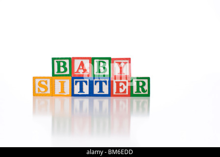 Colorata per bambini ortografia blocchi le parole BABY SITTER Foto Stock