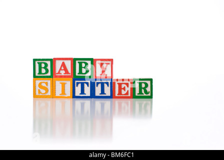 Colorata per bambini ortografia blocchi le parole BABY SITTER Foto Stock