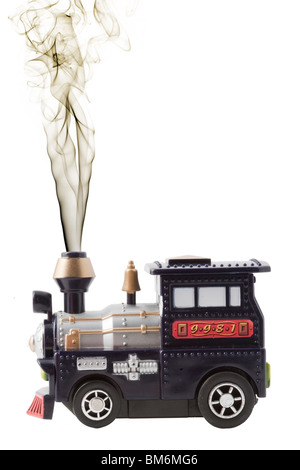 Toy motore a vapore con vapore proveniente da camino Foto Stock