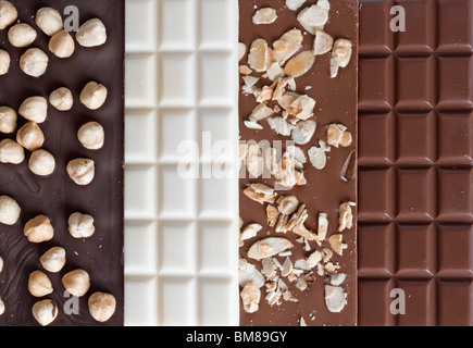 Quattro diversi sapori di barrette di cioccolato Foto Stock