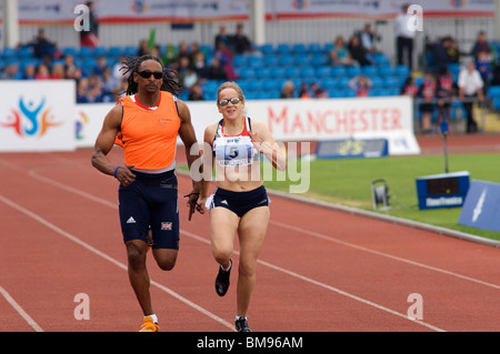 Ipovedenti runner e guida al paralympic world cup tenutasi a Manchester 2010 Foto Stock