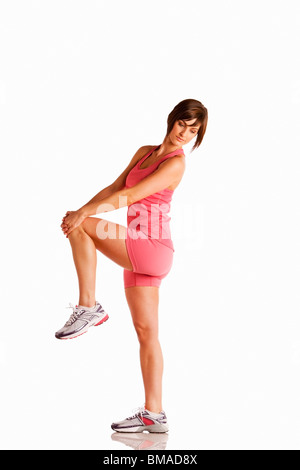 Donna che esercitano in Studio Foto Stock