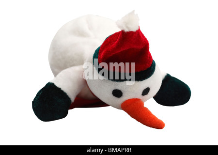 Pupazzo di neve bianco farcito con Red Hat e sciarpa pelliccia toy su sfondo bianco albero di Natale festival festosa snow uomo vestito scar Foto Stock