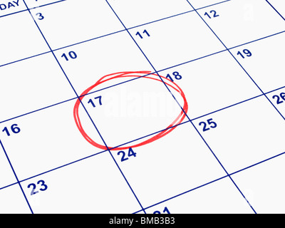 Una data cerchiata su un calendario. Foto Stock