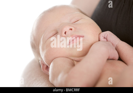 Neonato Boy in questo i bracci delle madri Foto Stock