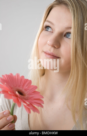 Donna Fiore di contenimento Foto Stock