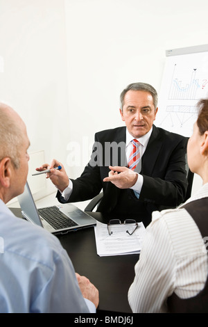 Gli imprenditori in consultazione Foto Stock