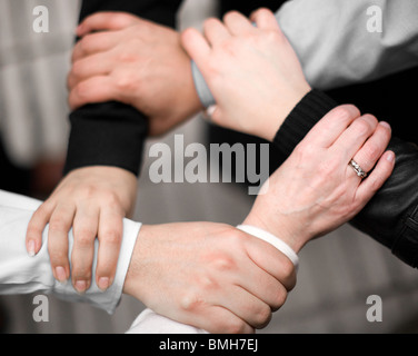 Mani che rappresenta il lavoro di squadra Foto Stock