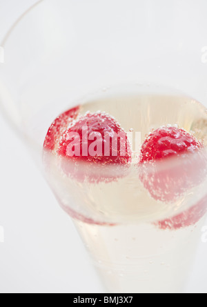 Lamponi in champagne Foto Stock