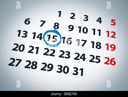 Una data cerchiata su un quindicesimo giorno di calendario con inchiostro blu. Foto Stock