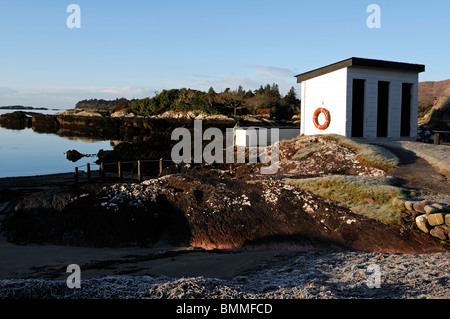 Bocca di marea roughty fiume kenmare fiume lough bay Parknasilla Sneem Irlanda boat house sicurezza dell'acqua Foto Stock