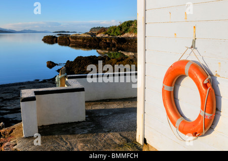 Bocca di marea roughty fiume kenmare fiume lough bay Parknasilla Sneem Irlanda boat house sicurezza dell'acqua Foto Stock