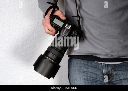Uomo con una telecamera Foto Stock