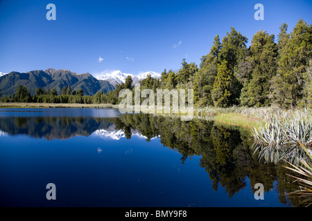La riflessione di Mt Cook e mt tasman lago matheson,Isola del Sud,Nuova Zelanda Foto Stock