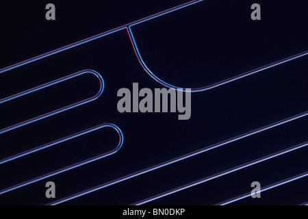 T microfluidico giunzione chip di vetro per la miscelazione di fluidi, microreactions, la formazione di goccioline in micro e nano tecnologia applicazioni Foto Stock