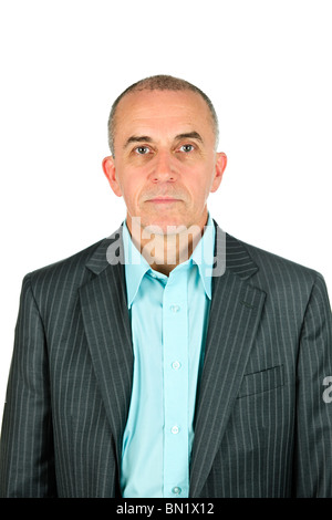 Ritratto di grave imprenditore isolato su sfondo bianco Foto Stock