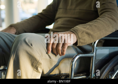Persona disabile in sedia a rotelle Foto Stock