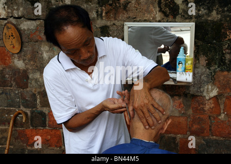 Barbiere di Hanoi, Vietnam Foto Stock