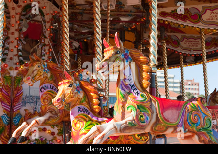 Giostra presso il molo approccio, Bournemouth Dorset. Foto Stock