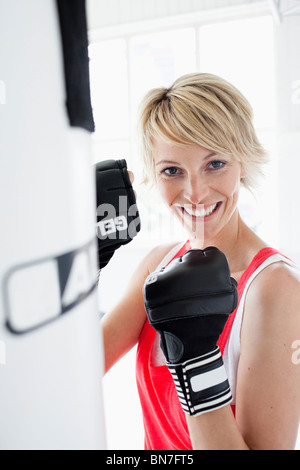 Inscatolamento della donna Foto Stock