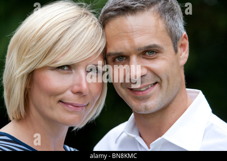 Coppia sorridente headshot Foto Stock