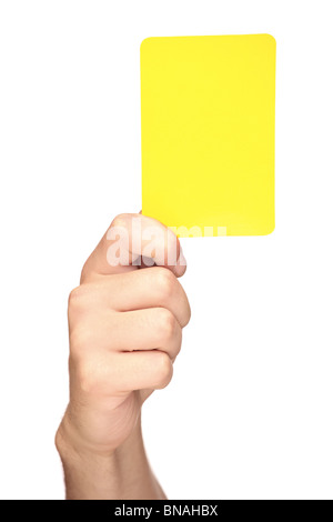 Mano che tiene un cartellino giallo Foto Stock