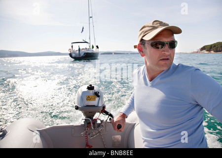 Uomo volante dinghy yacht Foto Stock