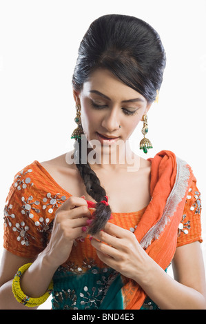 Close-up di una calza donna i suoi capelli Foto Stock