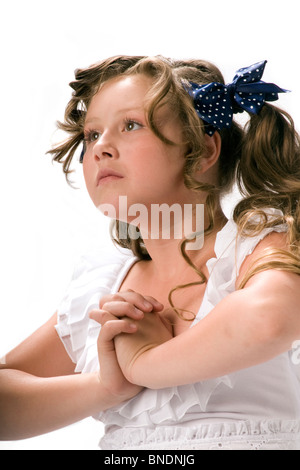 Ragazza innocente su bianco senza saldatura Foto Stock