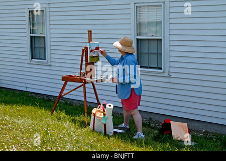 Costa del Maine Monhegan Island colonia di artisti New England USA remote offshore classe d'arte pittura donna al faro Foto Stock