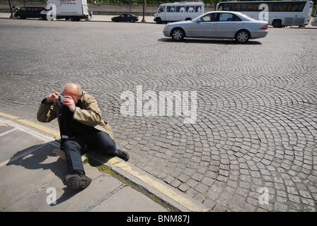 Fotografo acquisizione dello snapshot a Place de la Concorde Parigi Francia Foto Stock