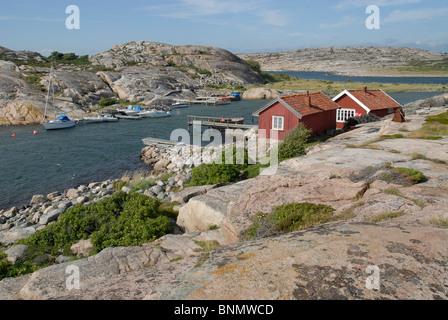 Case e barche presso il porticciolo di Tjurpannan, Svedese West Coast Foto Stock