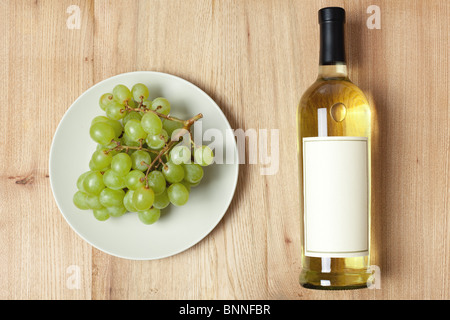 Photo shot di uve e di vino bianco Foto Stock