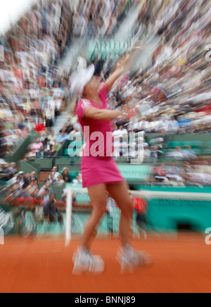 Justin Henin del Belgio in azione all'aperto francese 2010 ,Roland Garros, Parigi, Francia Foto Stock