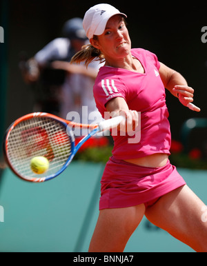 Justin Henin del Belgio in azione all'aperto francese 2010 ,Roland Garros, Parigi, Francia Foto Stock