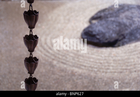 Giardino Zen e wind chime al Museo Morikami e giardini giapponesi è un centro di arti giapponesi in Palm Beach County Florica. Foto Stock