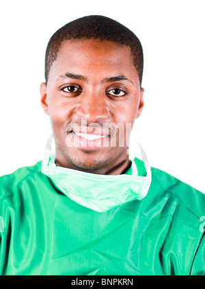 Senior chirurgo in scrub verde Foto Stock
