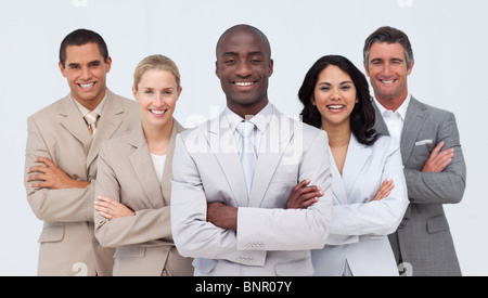 Multi-etnico team business tenendo un globo terrestre Foto Stock