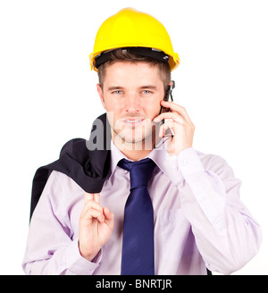 Operaio edile parlando al telefono Foto Stock