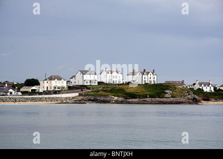 Case in tutta l'acqua, TREARDDUR BAY, Anglesey, Galles del Nord, Regno Unito Foto Stock