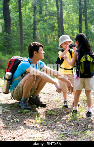 La famiglia in grandi spazi aperti Foto Stock