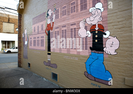 Olive Oyl e caratteri di Popeye, creato da Elzie Crisler Segar nel 1919, adornano le pareti di un edificio di Chester, in Illinois. Foto Stock