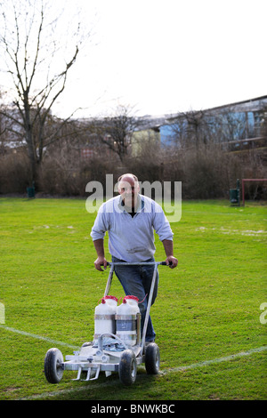Green Keeper con gadget di marcatura Foto Stock