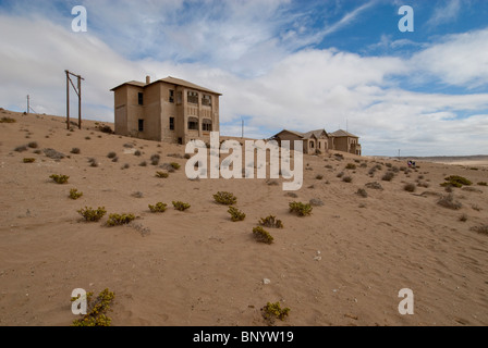 Africa, Namibia, Luderitz. Kolmanskop, ex diamond città mineraria abbandonata nel 1940. Foto Stock